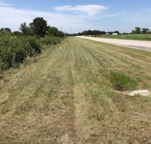 tractor mowing for council